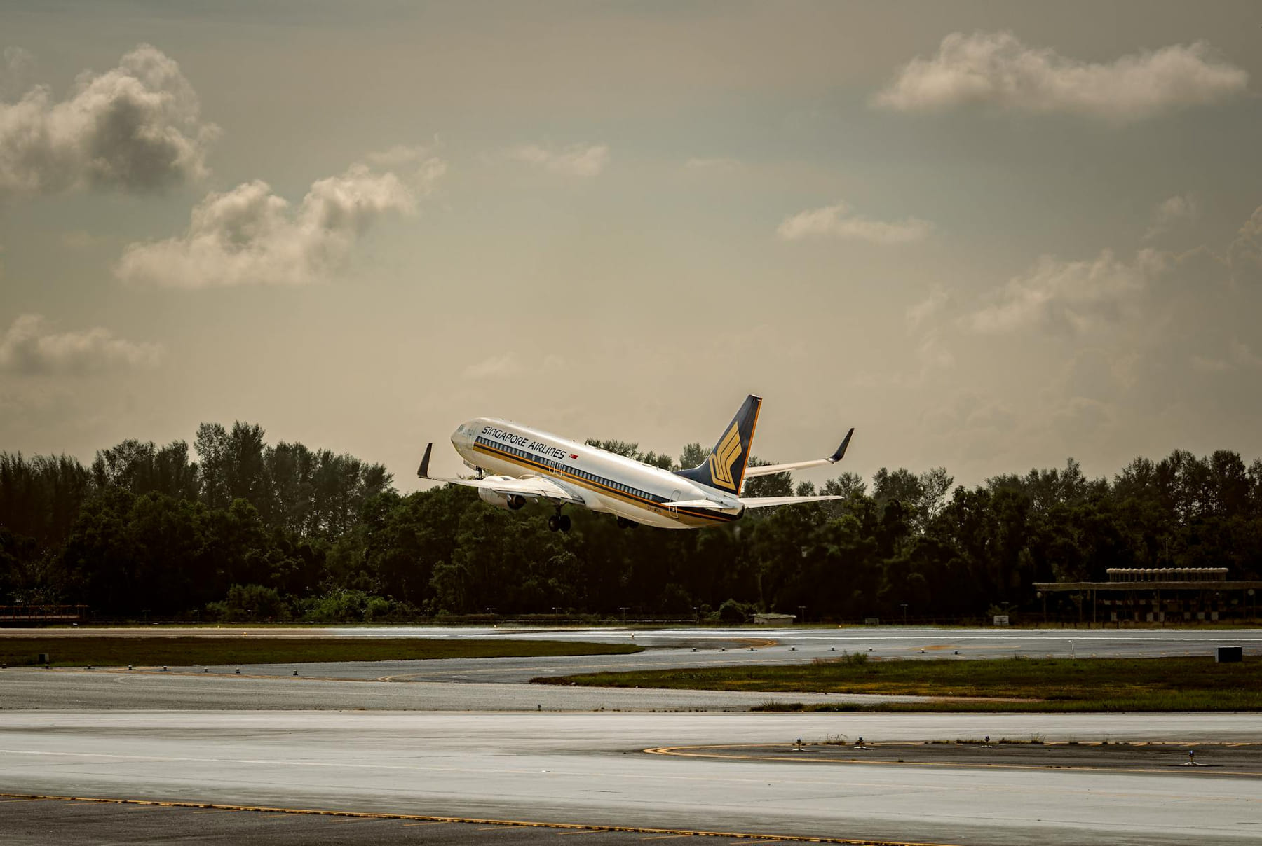 An airplane takes off from an airport runway, soaring into a partly cloudy sky. on Points and Pathways