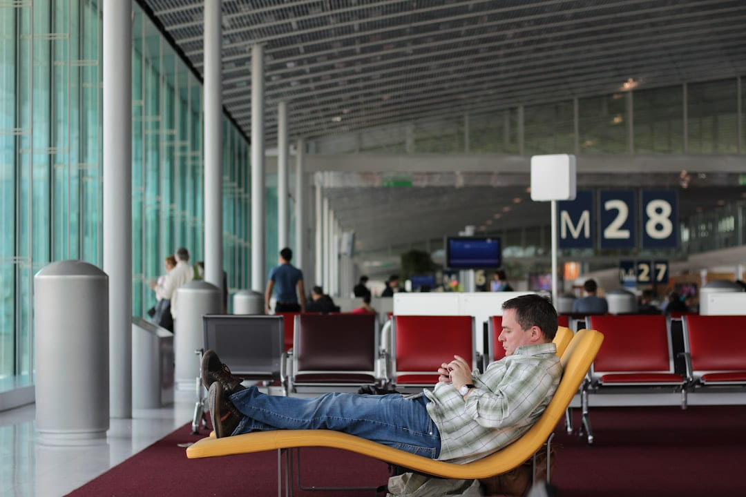 man sitting on airport waiting area on Points and Pathways