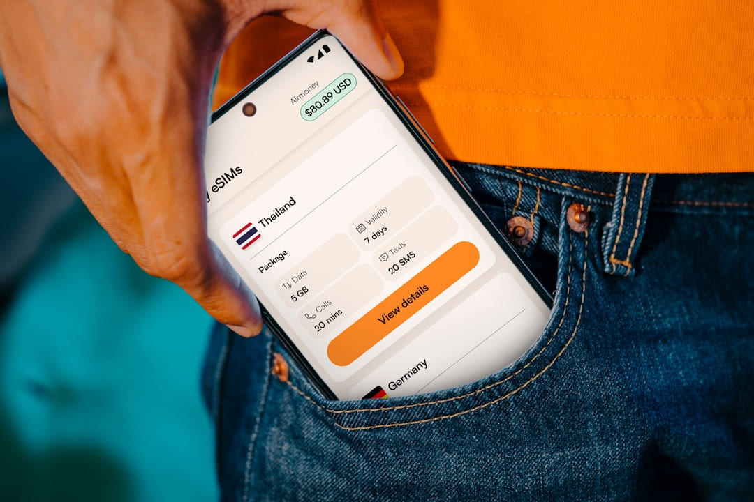 Smartphone displaying travel information in a pocket. on Points and Pathways