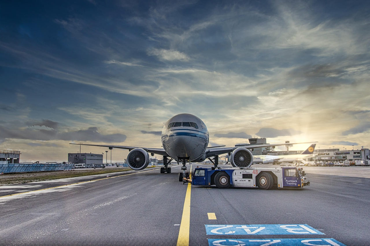 airplane, runway, airport, tarmac, aircraft, vehicle, truck, nature, airliner, clouds, asphalt, jet, flight, transportation system, air travel, outdoor, airline, plane, transportation, travel, airfield on Points and Pathways