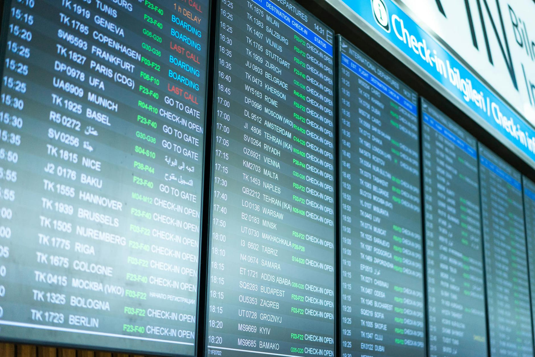 Digital screens display flight information and schedules at an airport terminal. on Points and Pathways