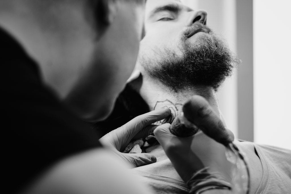 Tattoo artist at work - freestocks.org - Free stock photo on Points and Pathways